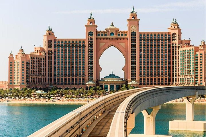 Experience the blend of modern architecture and rich heritage as you explore iconic landmarks culminating in a serene dinner cruise along Dubai Creek showcasing unparalleled views of the city.